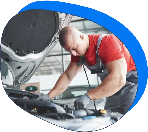 A mechanic fixing a car